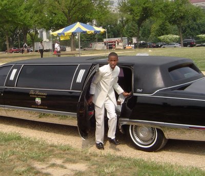 Harvey Jr., exting the limo